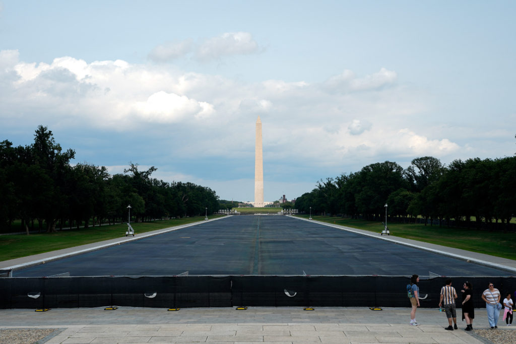 Justice Department dismisses case against Olympian David Hearn over Reflecting Pool damage