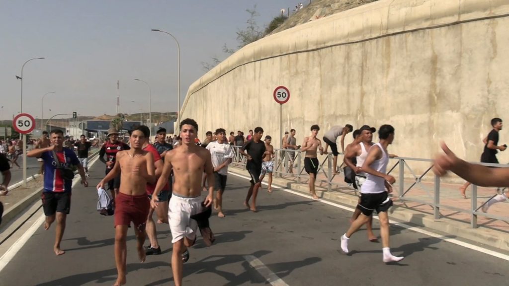 Large number of migrants cross into Ceuta from Morocco and return