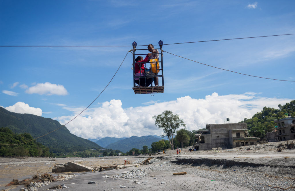 Rescuers in Nepal save two individuals from debris after floods