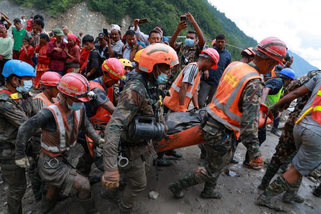 Two men rescued from Nepal tunnel nine days after flood