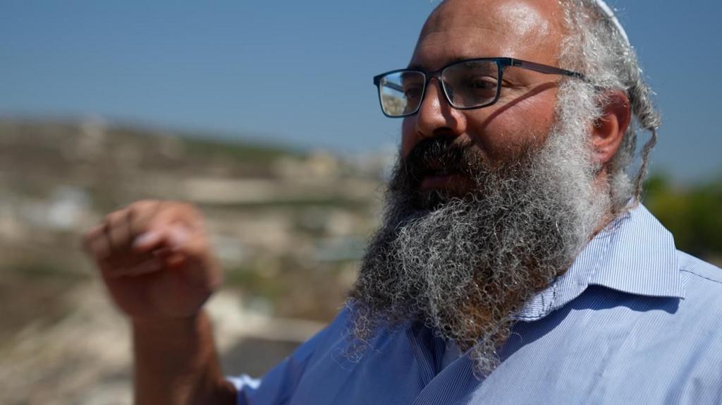 Israeli settler justifies violence against Palestinians in the West Bank