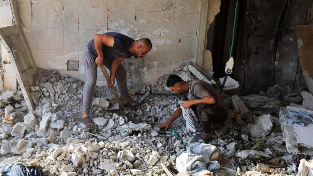 Israeli strikes in Gaza result in at least 13 deaths following disarmament agreement
