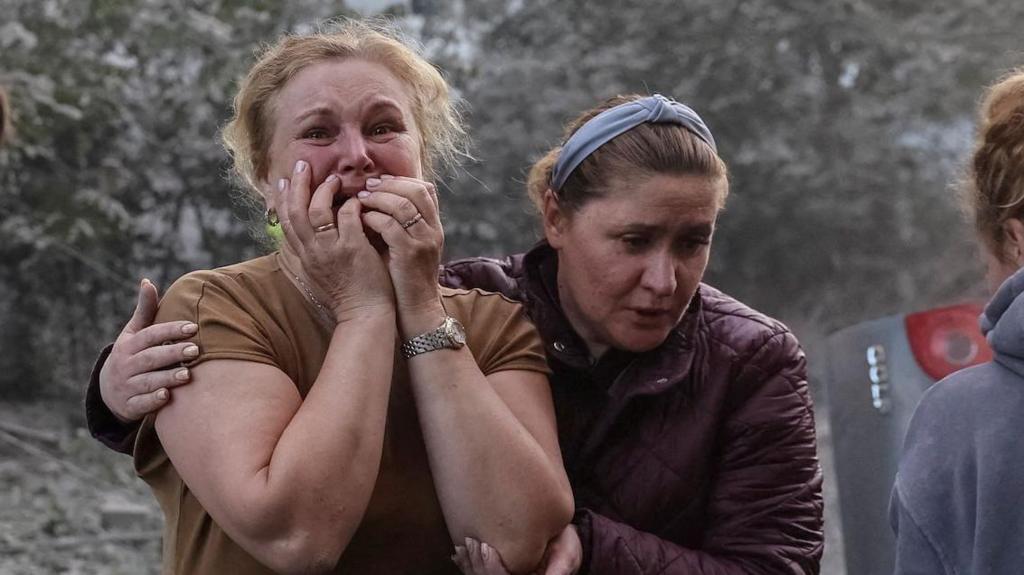 Eight killed, including three children, in Russian strikes on Ukrainian village