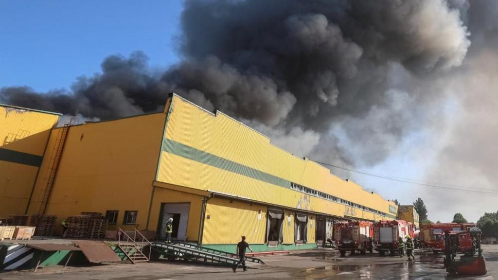 Nine people killed in attacks on Kyiv, Ukrainian forces sink Russian container ship