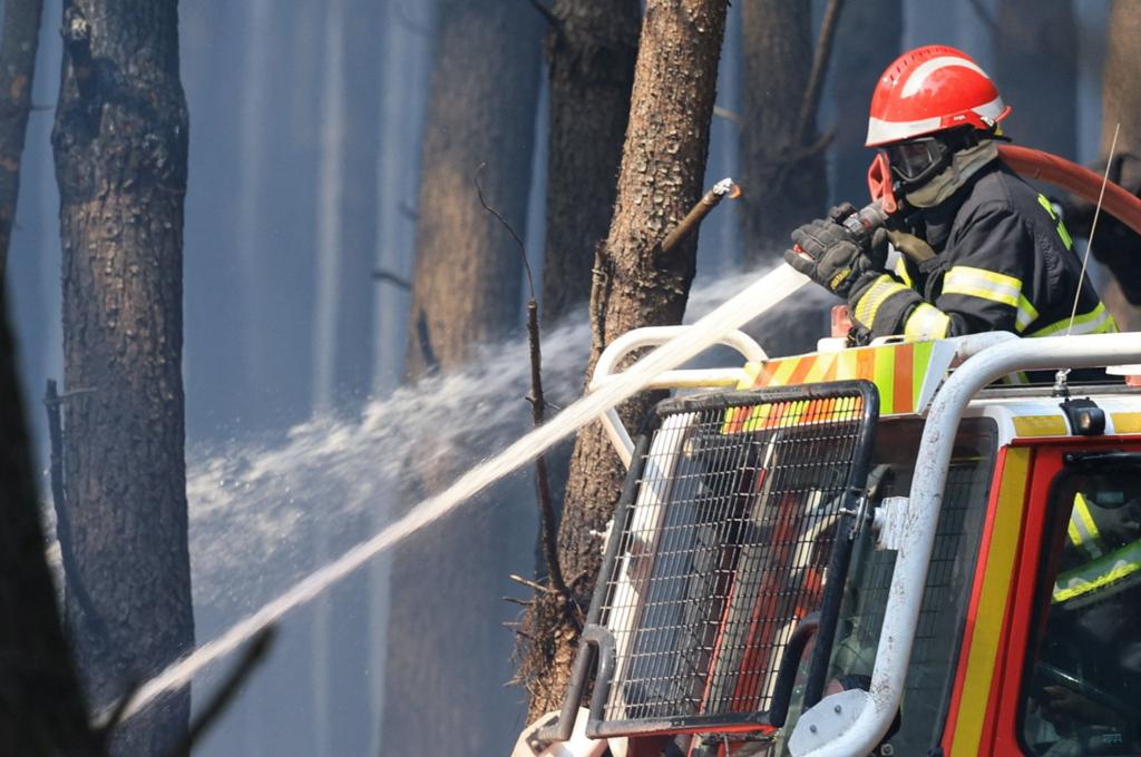 Fire crews work to contain wildfires in the Gironde region of France